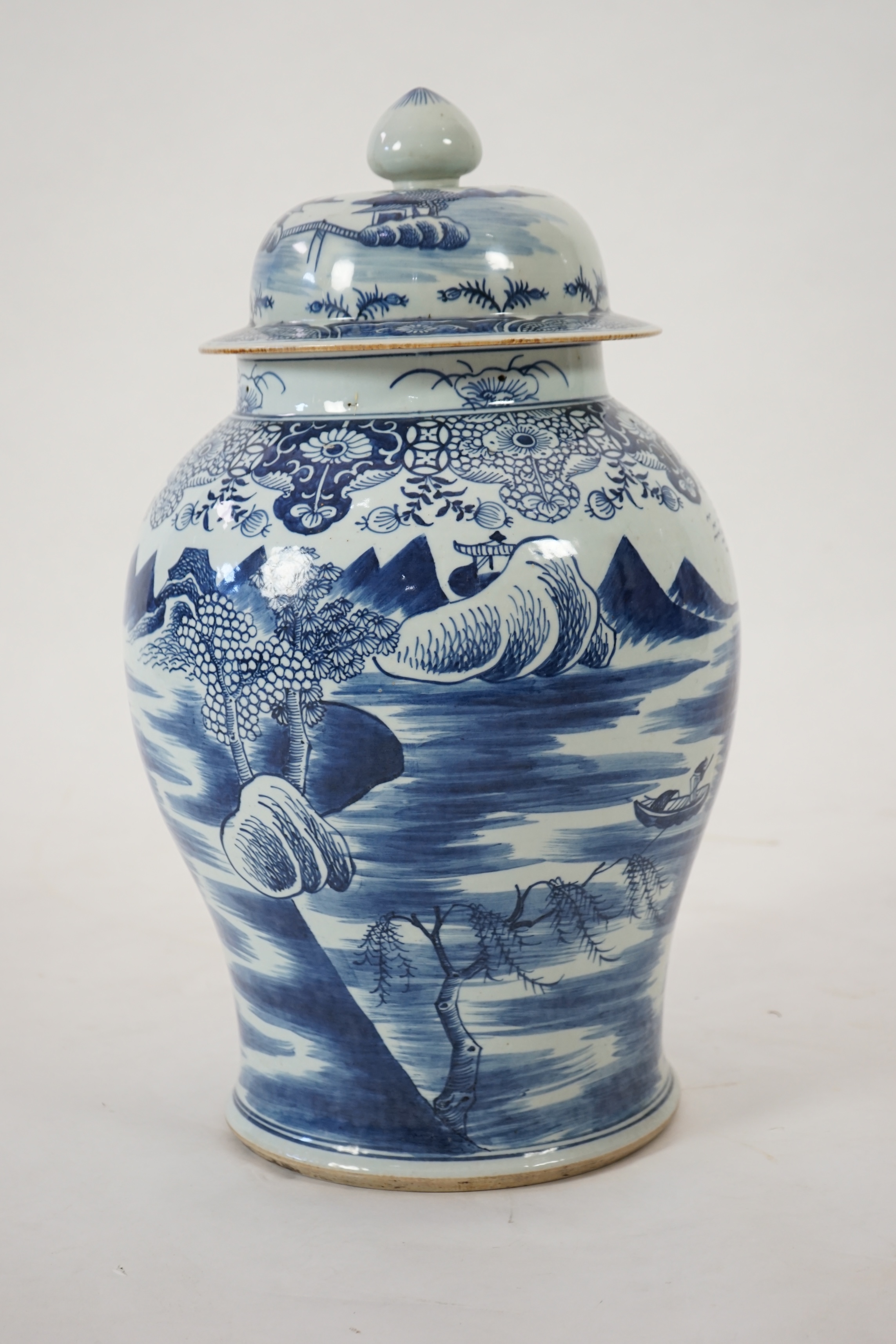 A massive Chinese blue and white ‘temple’ jar and cover, Qianlong period